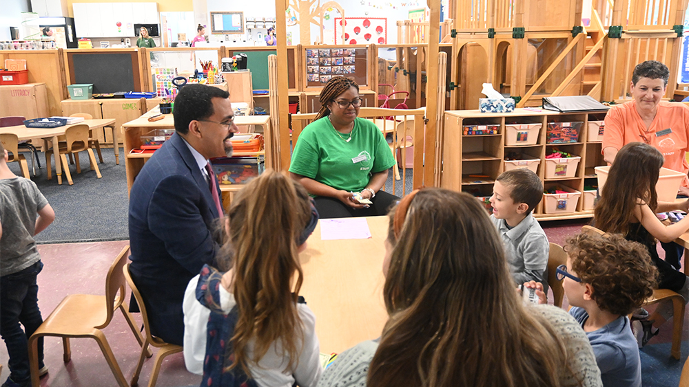 Visiting the Greenhouse Child Care Center Chancellor King, Janet Walsh, Director, NCC education major Sherise McDonald