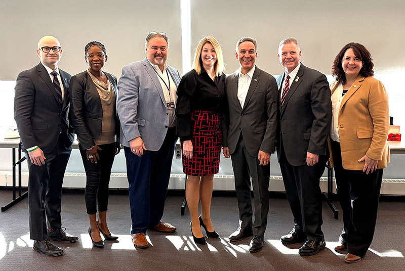 Assemblyman Ed Ra, from left, State Senator Siela Bynoe, NCC Board of Trustees Chairman Dr. Jorge L. Gardyn, NCC Chief Administrative Officer Dr. Maria Conzatti, State Senator Jack Martins, State Senator Steve Rhoads, and State Senator Patricia Canzoneri-Fitzpatrick.