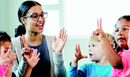 Teacher with students