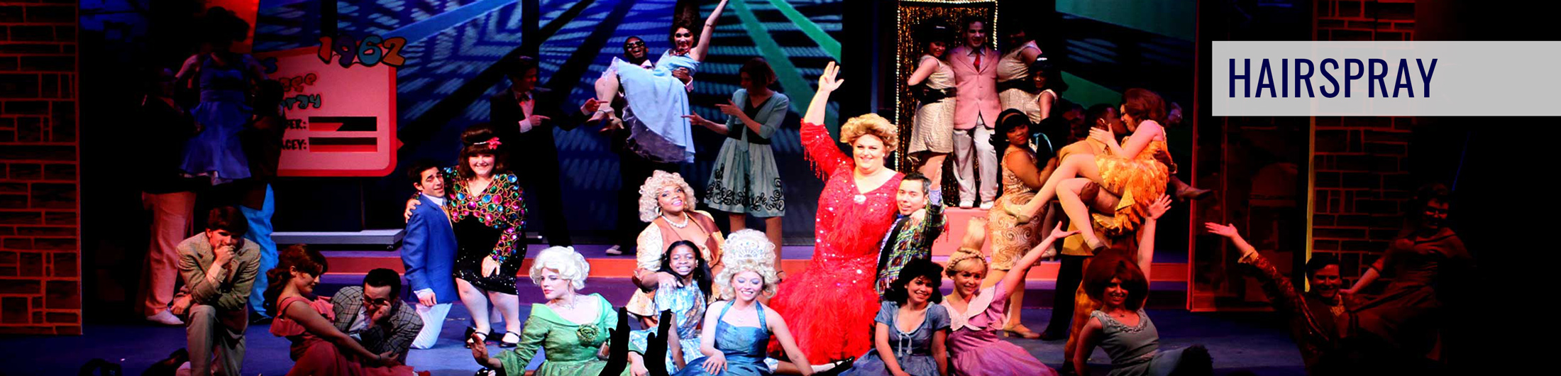 Image of Students on stage performing Hairspray