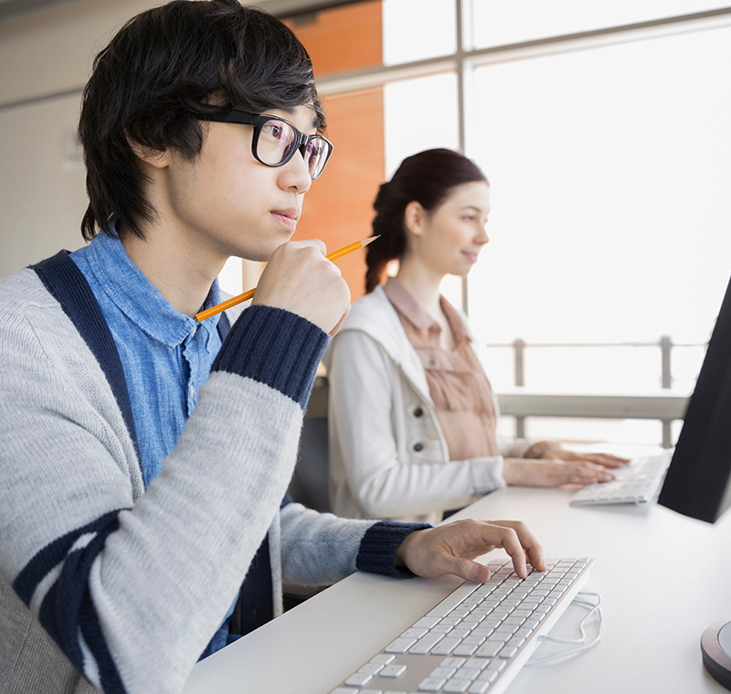 NCC Student on a computer